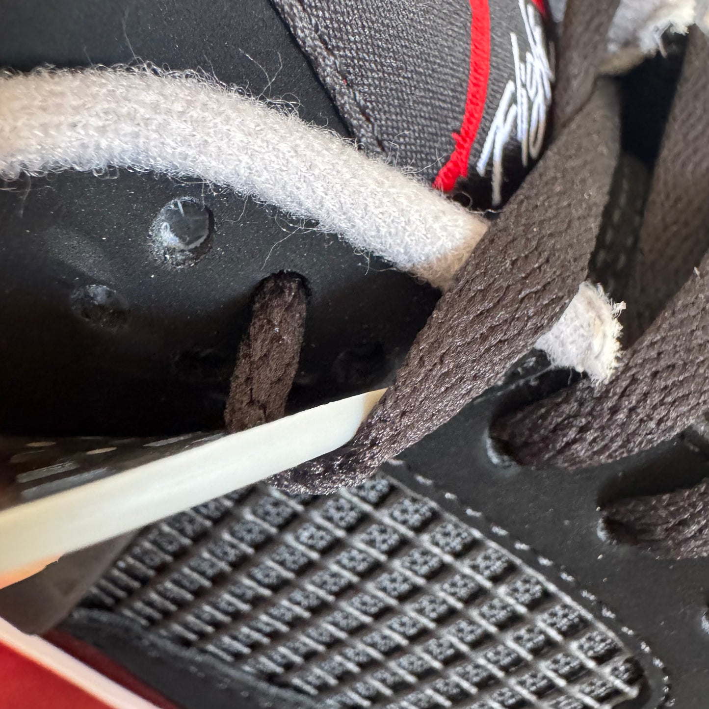 Jordan 4 Retro "Bred" (Black/Red) – The 1989 Classic
