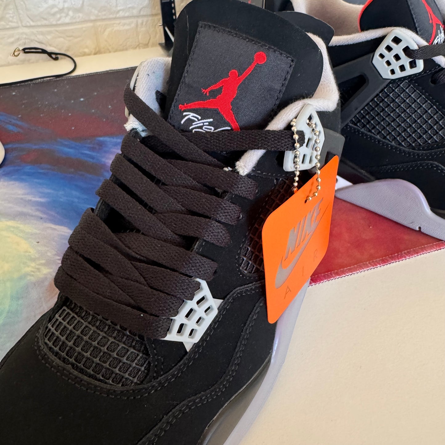 Jordan 4 Retro "Bred" (Black/Red) – The 1989 Classic