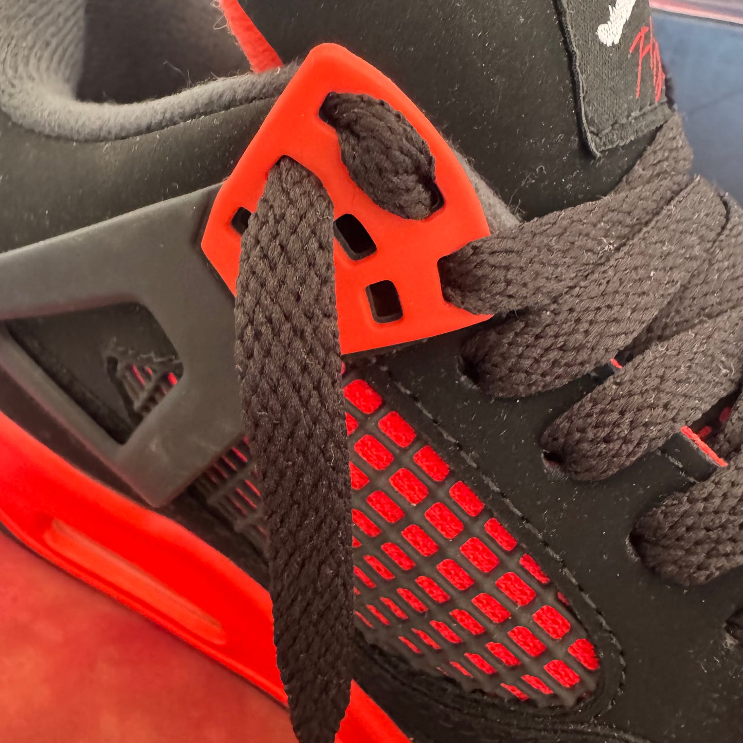 Jordan 4 Retro "Red Thunder"